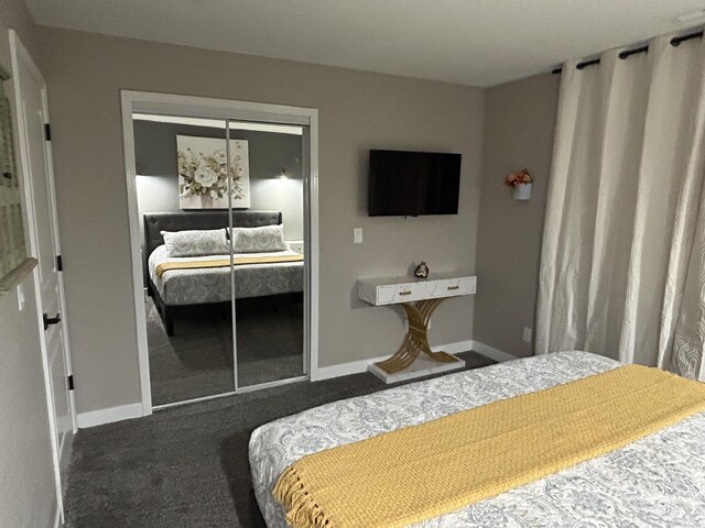 200 Meadow Ridge Ln Unit 6-2, Branson, MO 65616 - carpeted bedroom with a closet and baseboards