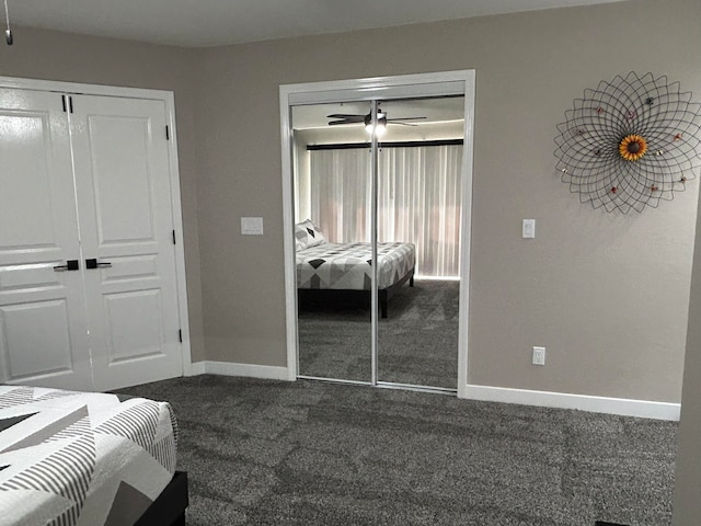 unfurnished bedroom featuring dark colored carpet