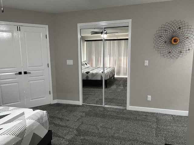 200 Meadow Ridge Ln Unit 6-2, Branson, MO 65616 - bedroom with dark colored carpet, baseboards, and a closet