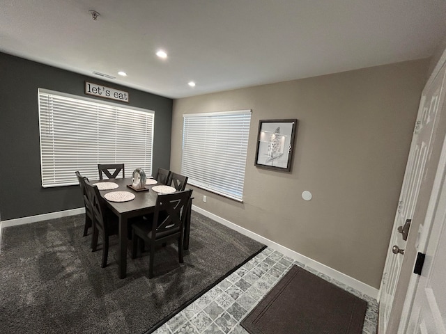 view of carpeted dining space