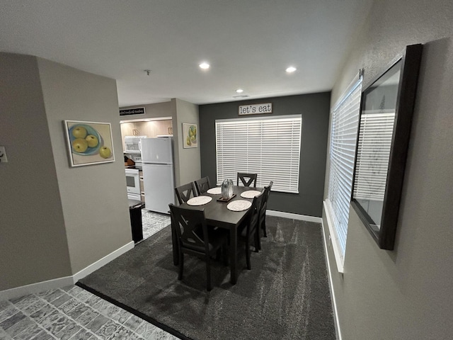 200 Meadow Ridge Ln Unit 6-2, Branson, MO 65616 - dining room featuring recessed lighting, dark carpet, and baseboards