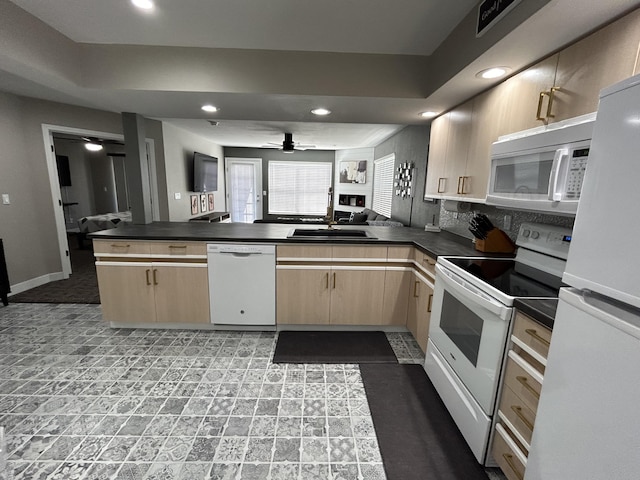 200 Meadow Ridge Ln Unit 6-2, Branson, MO 65616 - kitchen featuring dark countertops, light brown cabinetry, white appliances, ceiling fan, and a peninsula