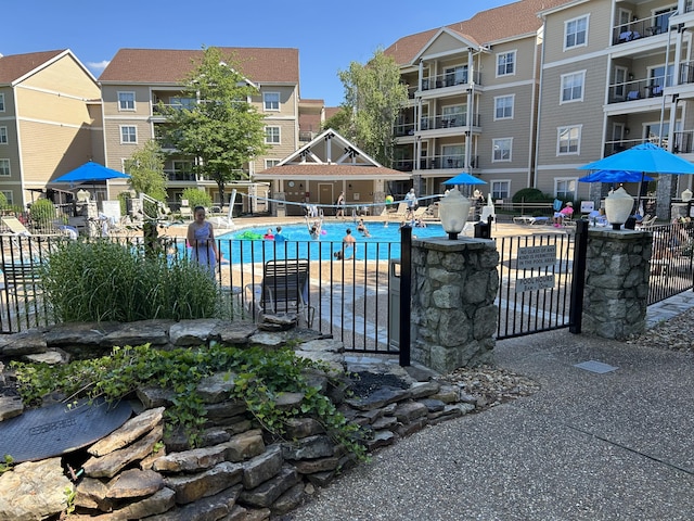 200 Meadow Ridge Ln Unit 6-2, Branson, MO 65616 - pool featuring fence and a patio