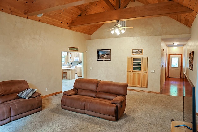 carpeted living room with lofted ceiling with beams, ceiling fan, and wooden ceiling