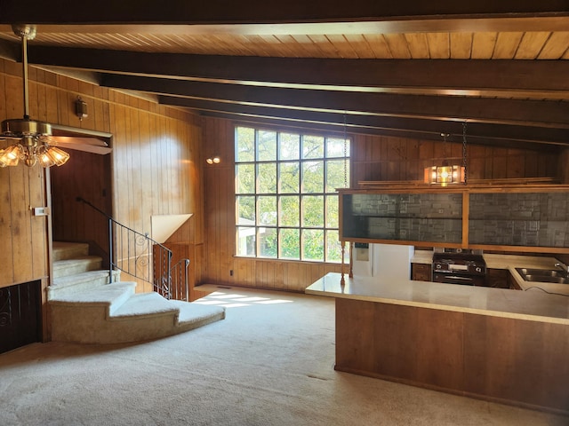 28409 Bali Rd, Warsaw, MO 65355 - interior space with beamed ceiling, a ceiling fan, wooden ceiling, and wood walls