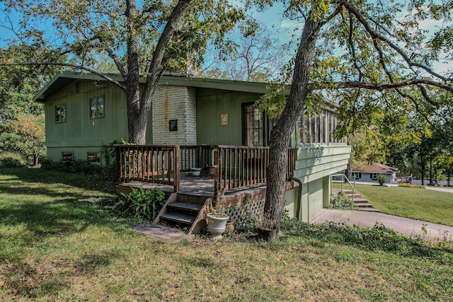 28409 Bali Rd, Warsaw, MO 65355 - exterior space featuring a yard, a chimney, an attached garage, and concrete driveway