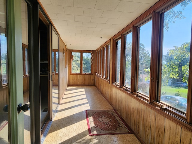 28409 Bali Rd, Warsaw, MO 65355 - unfurnished sunroom with wooden walls