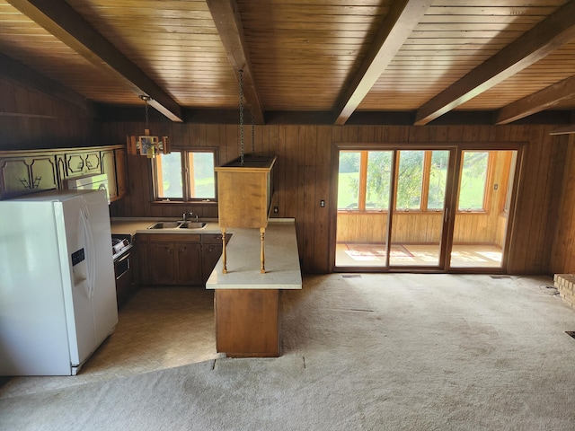 28409 Bali Rd, Warsaw, MO 65355 - kitchen with a sink, white refrigerator with ice dispenser, light colored carpet, and a peninsula