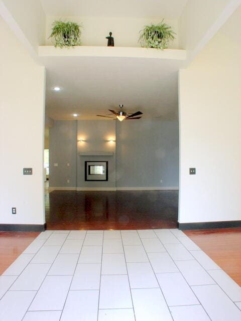 spare room featuring ceiling fan and hardwood / wood-style floors