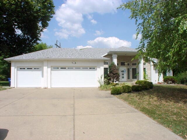 view of front of home with a garage