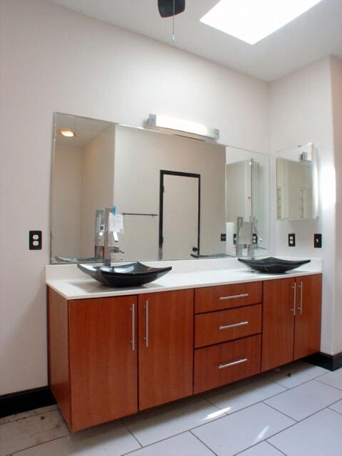 bathroom with tile patterned floors