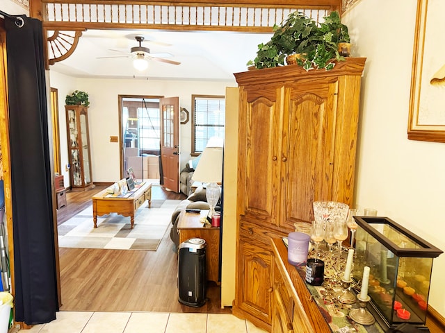 hallway with light hardwood / wood-style flooring