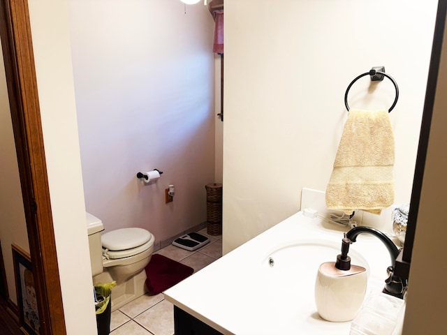 bathroom featuring vanity, toilet, and tile patterned floors