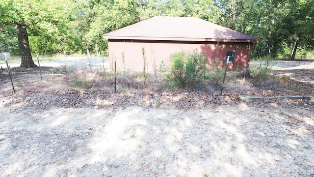 10520 County Road 237, Warsaw, MO 65355 - exterior space with a forest view and fence
