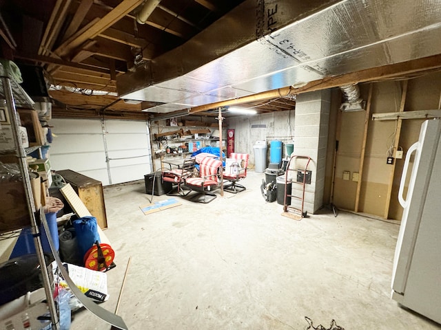 garage with white refrigerator