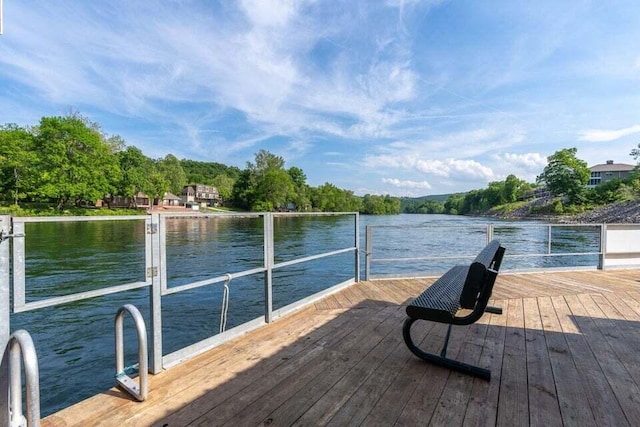 dock area featuring a water view