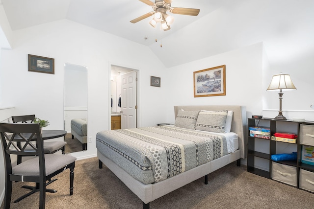 carpeted bedroom with ensuite bath, ceiling fan, and vaulted ceiling