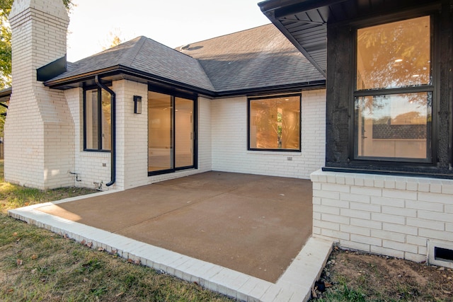 rear view of house with a patio area