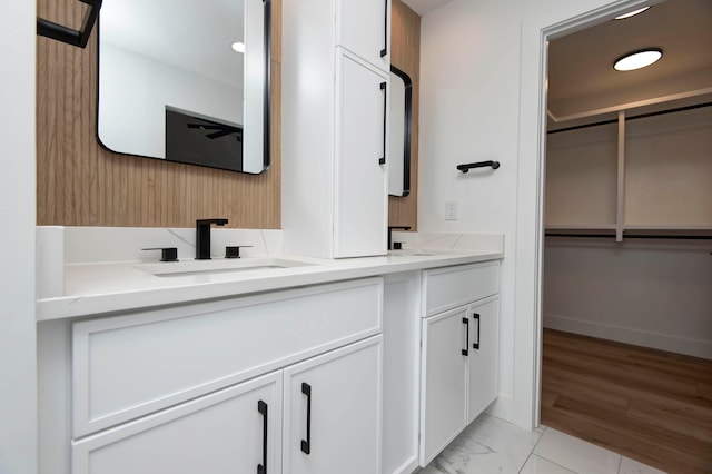 bathroom featuring vanity and hardwood / wood-style flooring