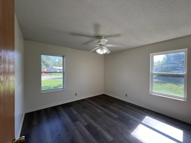 328 E 4th St, Willow Springs, MO 65793 - unfurnished room featuring dark wood-type flooring, plenty of natural light, a textured ceiling, and ceiling fan