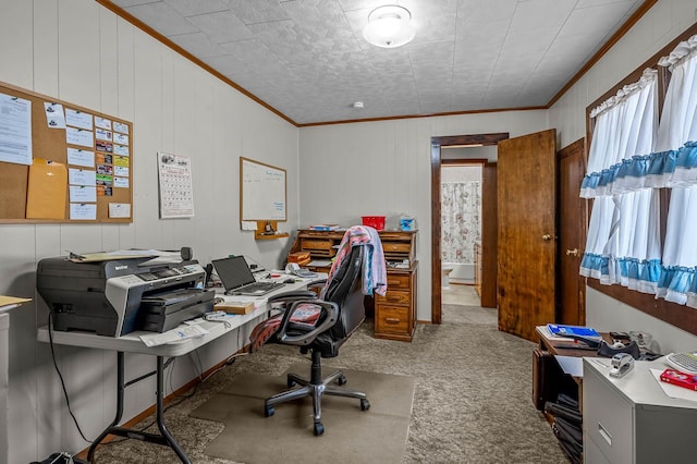 office space featuring crown molding, carpet, and wooden walls