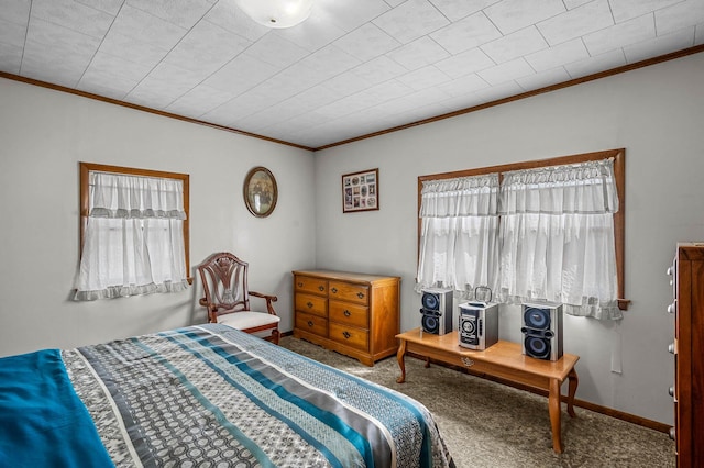 bedroom with carpet floors and ornamental molding