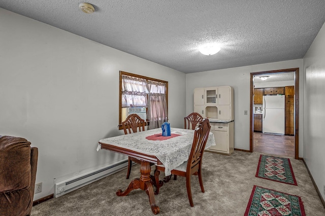 dining area with a textured ceiling, light carpet, cooling unit, and baseboard heating