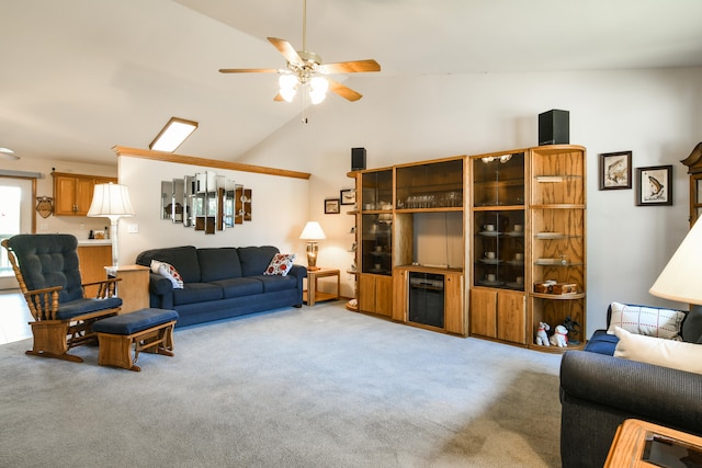 carpeted living room featuring ceiling fan and high vaulted ceiling