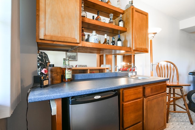 15 Bay Front Ln Apt A, Kimberling City, MO 65686 - bar featuring a sink, dishwasher, and carpet