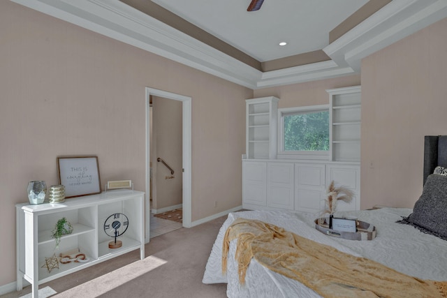 bedroom with ceiling fan and light carpet