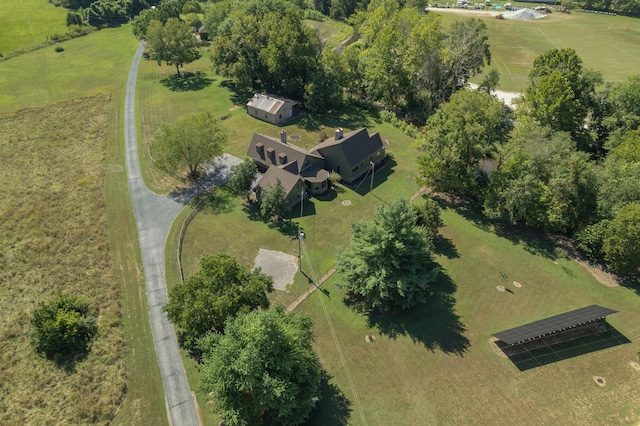 birds eye view of property with a rural view