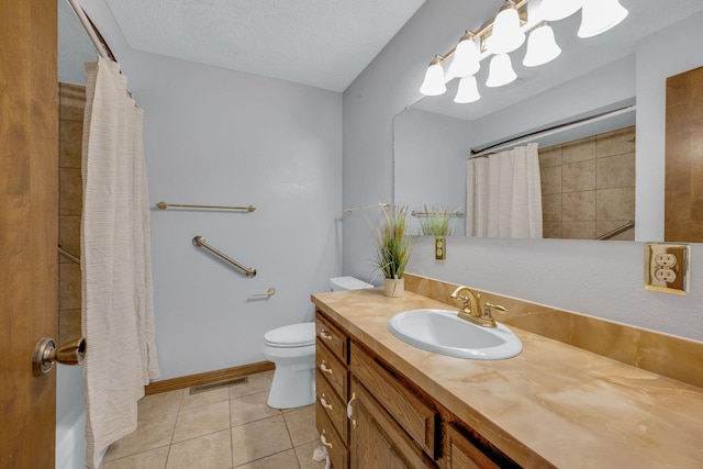 bathroom featuring curtained shower, tile patterned flooring, a textured ceiling, toilet, and vanity