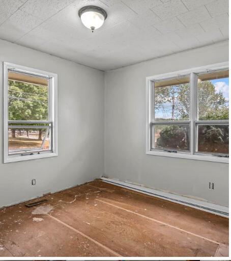 unfurnished room with a wealth of natural light
