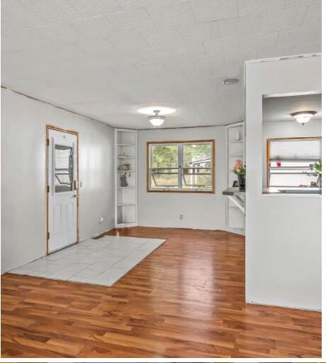 foyer entrance with wood finished floors
