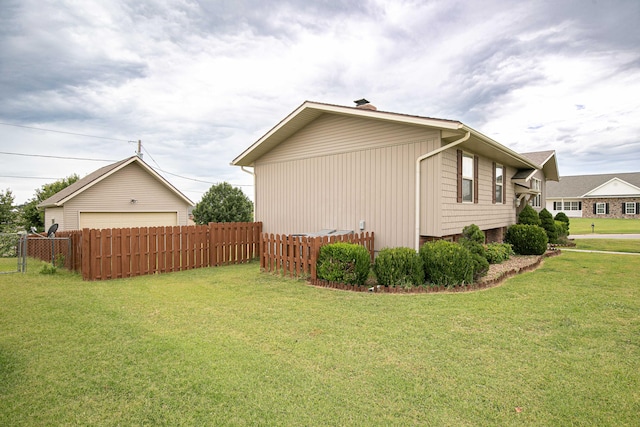 view of home's exterior with a lawn