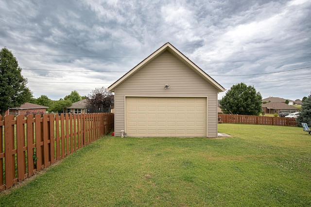 garage with a lawn