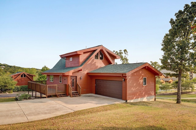 log-style house featuring a garage, a wooden deck, and a front lawn