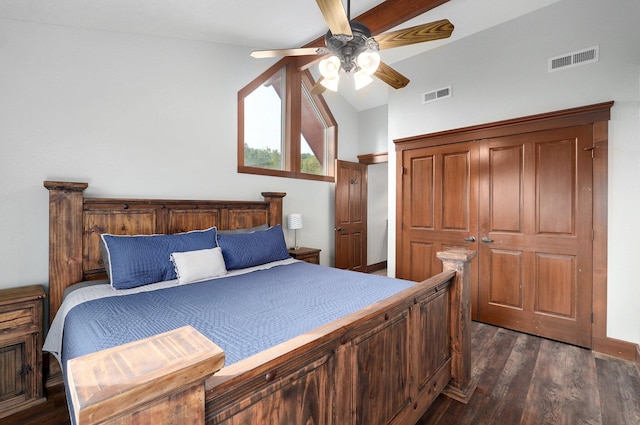 bedroom featuring ceiling fan, dark wood-type flooring, and vaulted ceiling