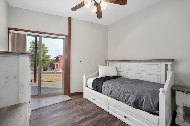 bedroom featuring access to exterior, dark hardwood / wood-style flooring, and ceiling fan