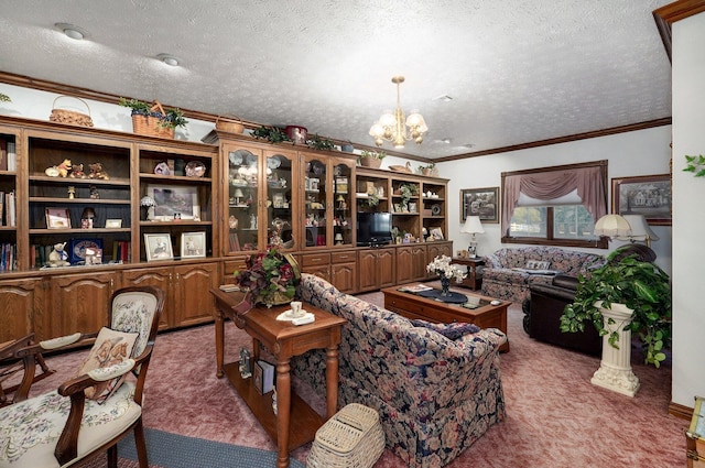 living room with a textured ceiling, a chandelier, ornamental molding, and carpet