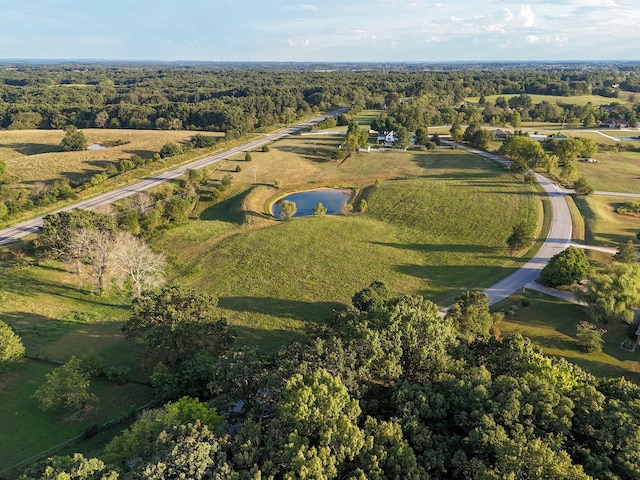 bird's eye view with a rural view and a water view