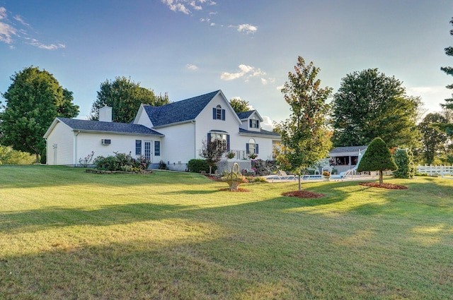 1568 Glossip Ave, Highlandville, MO 65669 - back of house featuring a lawn and a chimney