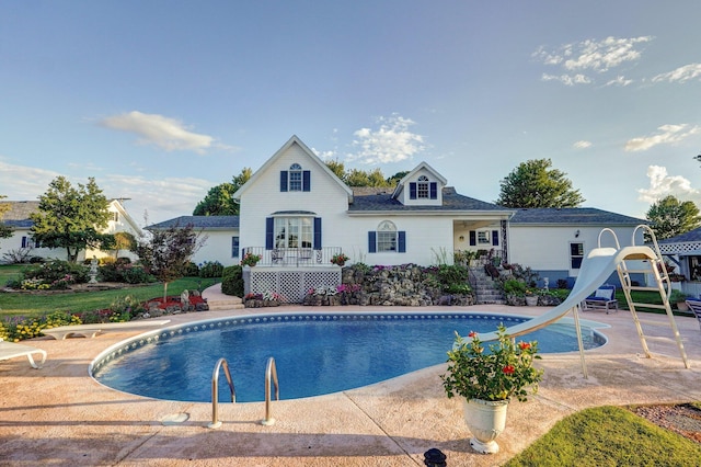 1568 Glossip Ave, Highlandville, MO 65669 - outdoor pool with a water slide and a diving board