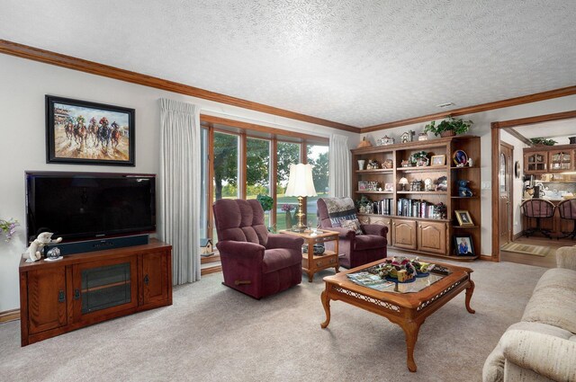 living room with ornamental molding, light carpet, and a textured ceiling