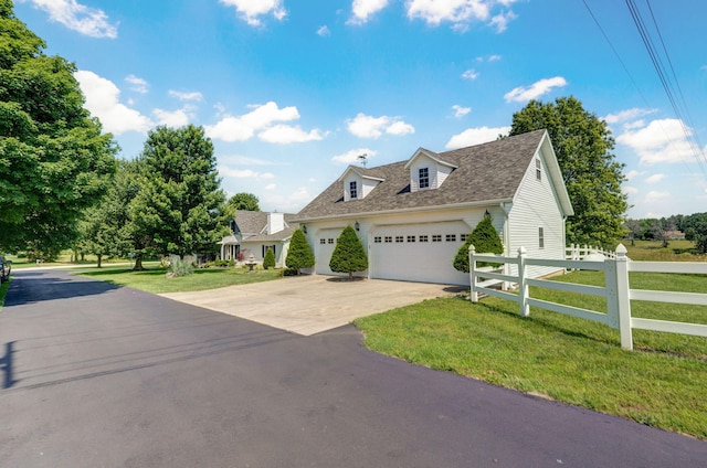 1568 Glossip Ave, Highlandville, MO 65669 - new england style home with driveway, a garage, and roof with shingles