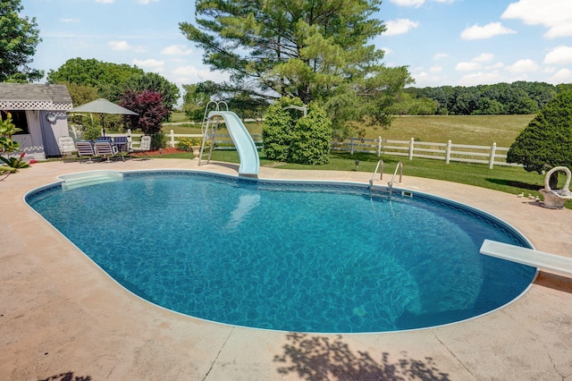 1568 Glossip Ave, Highlandville, MO 65669 - view of pool with a water slide, a patio area, and a diving board