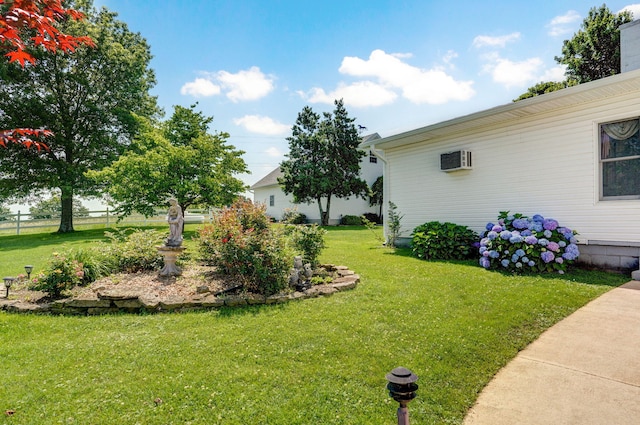 1568 Glossip Ave, Highlandville, MO 65669 - view of green lawn with an AC wall unit