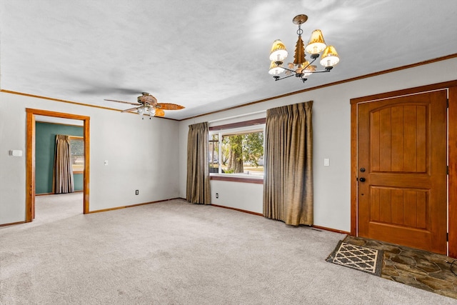 carpeted entryway featuring a textured ceiling, ceiling fan with notable chandelier, and crown molding