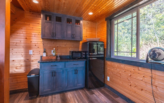 1326 Bald Eagle Dr, Galena, MO 65656 - kitchen featuring recessed lighting, wooden walls, wood ceiling, and black appliances