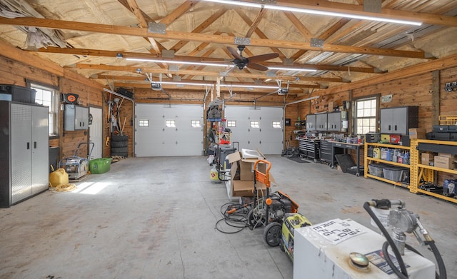 1326 Bald Eagle Dr, Galena, MO 65656 - garage featuring a workshop area and a garage door opener